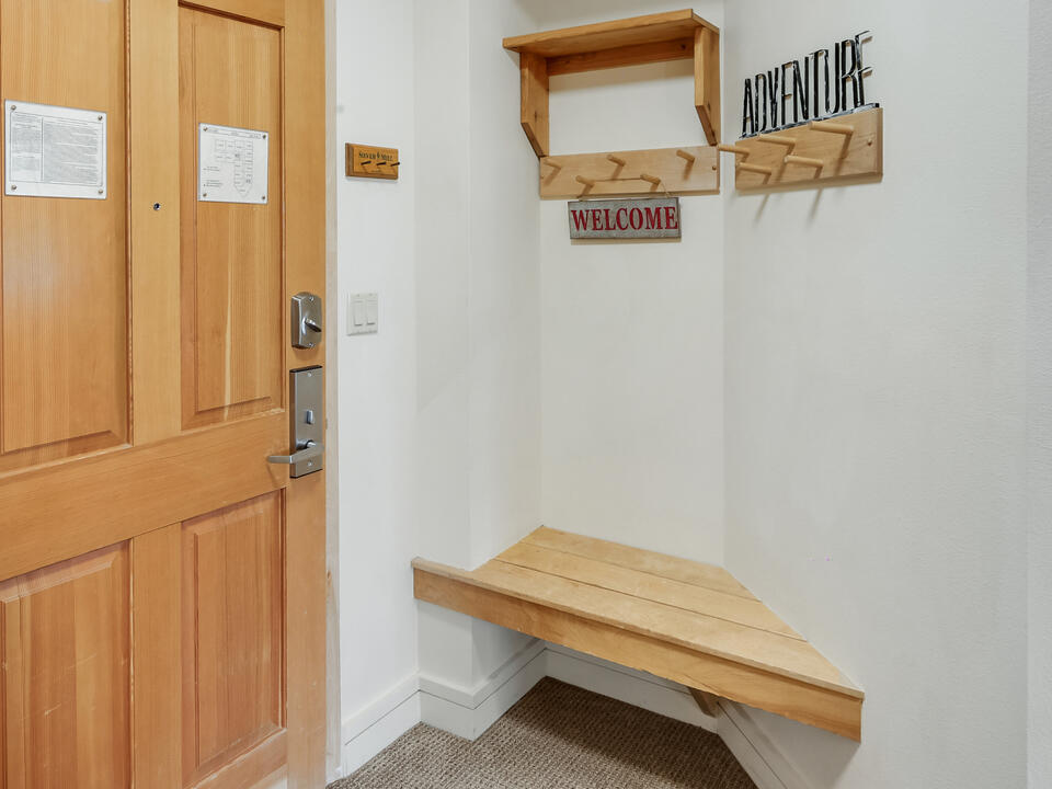 Entry area with hooks and storage and a bench for getting ready