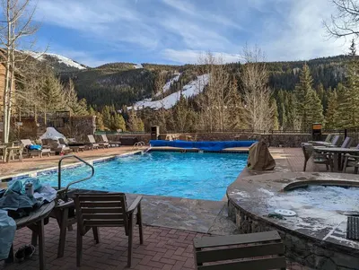 Heated outdoor pool with mountain views
