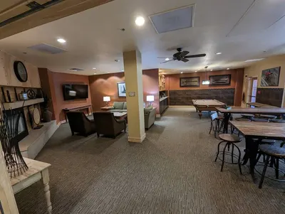 Common rec room with pool table and lounge