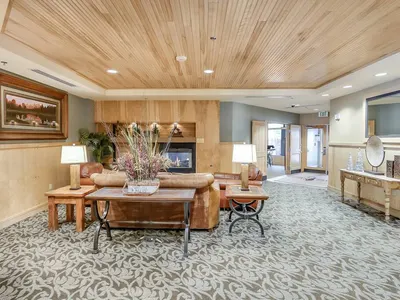 Building lobby with fireplace and mountain lodge decor